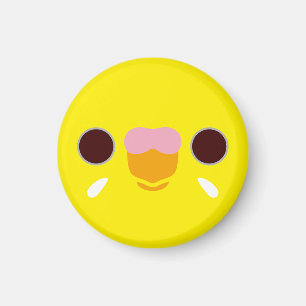 The face of a lutino budgie magnet
