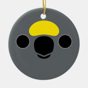 The face of a Meyer's Parrot Ceramic Tree Decoration