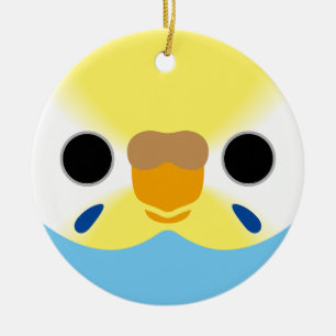 The face of a pastel rainbow female budgie ceramic tree decoration