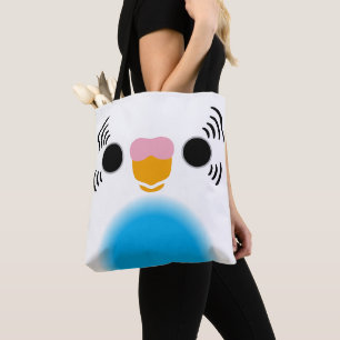 The face of a sky blue recessive pied budgie tote bag