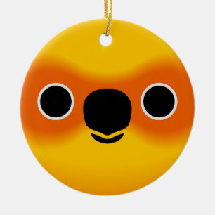 The face of a Sun Conure Ceramic Tree Decoration
