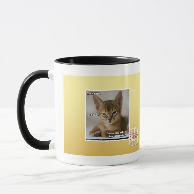 The feather is dead. mug (Left)