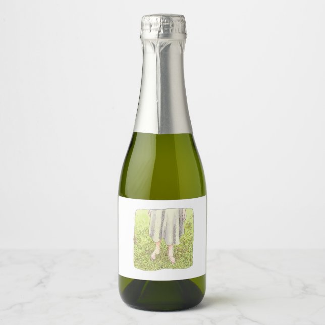the feet of a one-piece woman standing barefoot on sparkling wine label (Front)