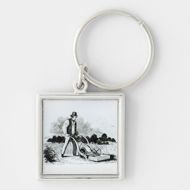 The first lawnmower (engraving) (b/w photo) key ring (Front)