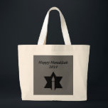 The Flame & Star - Large Tote Bag<br><div class="desc">This image is a flame from a candle. A star around the flame represents Hanukkah. Done in a black tattoo. A black backround was also added. "Happy Hanukkah 2014" is printed on this design. Customise with your own words. These totes are available in assorted styles,  colours and sizes.</div>