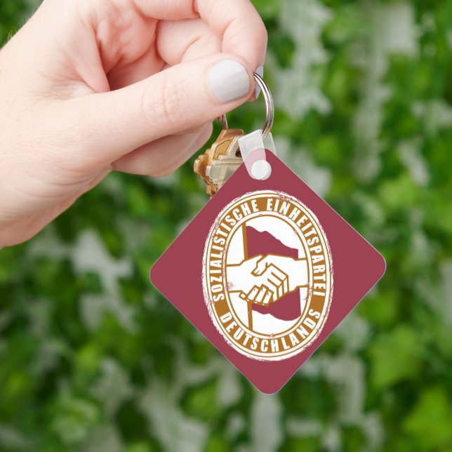 THE FUTURE BELONGS TO US KEY RING (Hand)