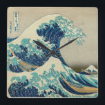 The Great Wave off Kanagawa Square Wall Clock<br><div class="desc">The Great Wave off Kanagawa. The Great Wave off Kanagawa (神奈川沖浪裏 Kanagawa-oki nami ura?, "In the well of a wave off Kanagawa"/"Under the wave off Kanagawa"), also known as The Great Wave or simply The Wave, is a woodblock print by the Japanese ukiyo-e artist Hokusai. It was published sometime between...</div>