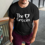 The GROOM (name) T-Shirt<br><div class="desc">The groom will love this t-shirt as he gets ready for his big day.
Text says  the GROOM.  The same text and colour repeats on the back of this
t-shirt.  The text is an image so that the colour can be changed to any you choose.</div>