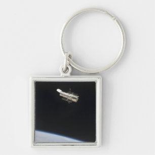 The Hubble Space Telescope in orbit above Earth 2 Key Ring