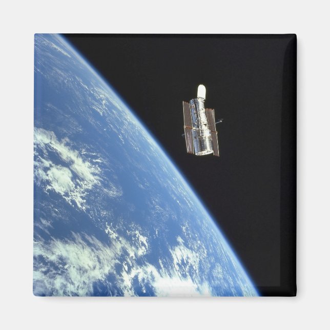 The Hubble Space Telescope with a blue earth Magnet (Front)