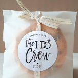 The I Do Crew | Wedding Party Black | White Classic Round Sticker<br><div class="desc">Make the awesome people in your wedding party feel extra special and appreciated with these customisable wedding stickers. The design features the words "The I do crew" in an elegant yet modern script style. The word 'do' features a sparkling diamond ring in place of the letter 'O' to signify the...</div>