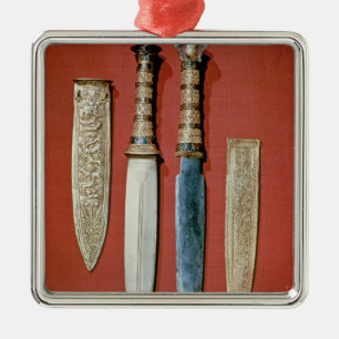 The king's two daggers, from tomb of metal tree decoration