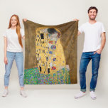 The Kiss by Gustav Klimt Fleece Blanket<br><div class="desc">The Kiss by Gustav Klimt The Kiss is an oil-on-canvas painting with added gold leaf, silver and platinum. by the Austrian Symbolist painter Gustav Klimt. It was painted at some point in 1907 and 1908, during the height of what scholars call his "Golden Period". Featuring shimmering gold tones, stylized forms,...</div>