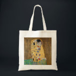 The Kiss by Gustav Klimt Tote Bag<br><div class="desc">The Kiss by Gustav Klimt The Kiss is an oil-on-canvas painting with added gold leaf, silver and platinum. by the Austrian Symbolist painter Gustav Klimt. It was painted at some point in 1907 and 1908, during the height of what scholars call his "Golden Period". Featuring shimmering gold tones, stylized forms,...</div>