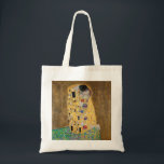 The Kiss by Gustav Klimt Tote Bag<br><div class="desc">The Kiss by Gustav Klimt The Kiss is an oil-on-canvas painting with added gold leaf, silver and platinum. by the Austrian Symbolist painter Gustav Klimt. It was painted at some point in 1907 and 1908, during the height of what scholars call his "Golden Period". Featuring shimmering gold tones, stylized forms,...</div>