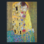 The Kiss by Gustav Klimt, Vintage Art Nouveau Spiral Notebook<br><div class="desc">The Kiss (Der Kuss) (1907/08) by Gustav Klimt is probably his most famous work. Klimt began work on it in 1907 and it is the highpoint of his so-called 'Golden Period'. The Kiss is a vintage Victorian Era Symbolism fine art love and romance painting featuring a romantic couple in various...</div>