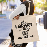 The Library Is Calling And I Must Go Reading Books Tote Bag<br><div class="desc">Funny bookworm saying tote bag that reads: "The library is calling and I must go". Makes a great gift for reading and book lovers.</div>