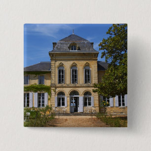 The main chateau building, renovated by 15 cm square badge