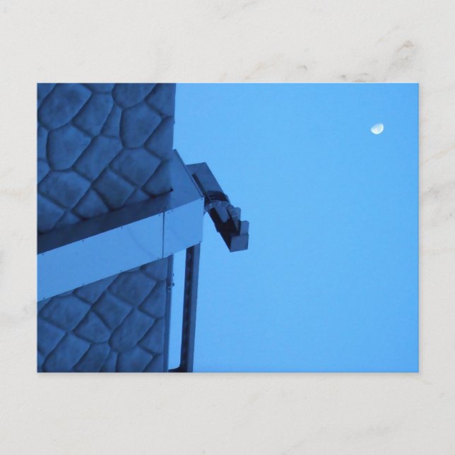 The moon hangs above the breakwater.  postcard (Front)