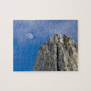 The moon rises and shines through the clouds jigsaw puzzle