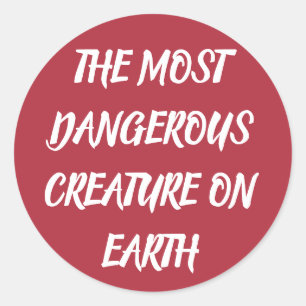 THE MOST DANGEROUS CREATURE ON EARTH CLASSIC ROUND STICKER