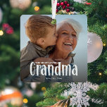 The Most Loved GRANDMA' Cute Gift  Metal Tree Decoration<br><div class="desc">Let a grandmother know how much she is loved with this; Cute Modern Custom Photo Grandma Christmas Ornament. Design features fun white typography that reads 'The Most Loved GRANDMA'. Simply upload your favourite picture and personalise the name/s of who its from. Text colour can be changed by using the 'customise...</div>