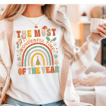 The Most Wonderful Time Of The Year Christmas Tri-Blend Shirt<br><div class="desc">The Most Wonderful Time Of The Year Retro Christmas Festive Holiday Tri-Blend Shirt features the text "The Most Wonderful Time Of The Year" in modern script typography accented with rainbow, Christmas tree, holly, Santa hat and snowflakes. Perfect for Christmas gifts, Christmas parties and holiday celebrations, birthdays and more. Created by...</div>