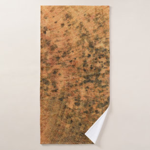 The mould that grows on the brown wood surface is bath towel