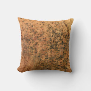 The mould that grows on the brown wood surface is cushion