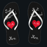 The Mrs. of Mr. & Mrs. Just Married Flip Flops<br><div class="desc">These fun Just Married flip flops are the perfect gift for the bride to be. The design features black flip flops with the words "Just Married" in a fun girly typography at an angle. In the middle is a red heart with your initials or monograms. At the heal is the...</div>