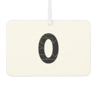 The number zero (0) in black car air freshener