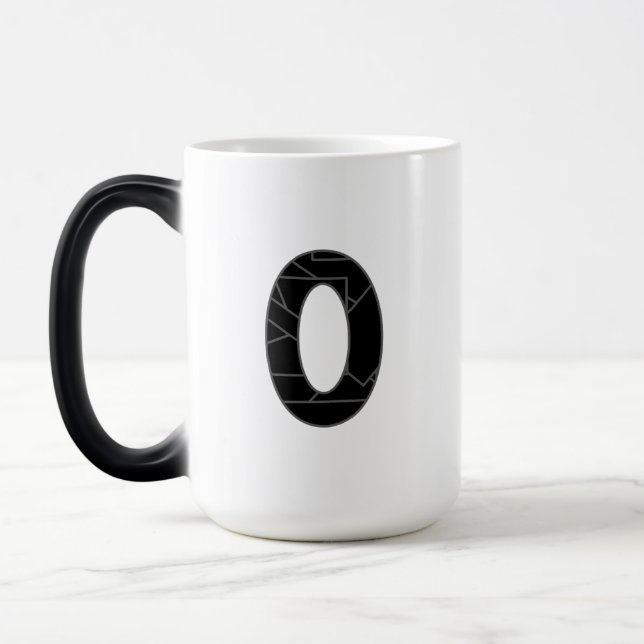 The number zero (0) in black magic mug (Left)