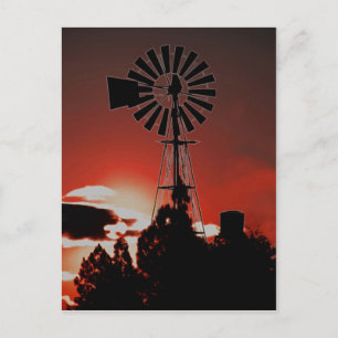 The old windmill at sunset postcard