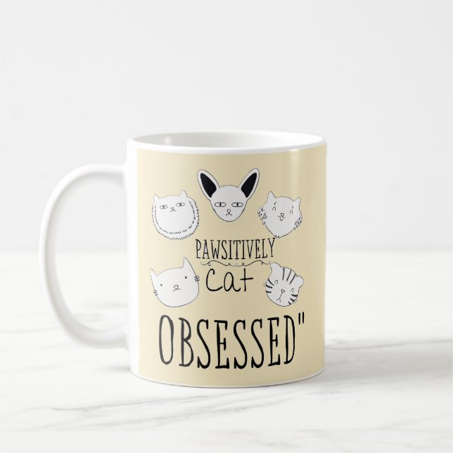 The "Pawsitively Cat Obsessed" Coffee Mug (Left)