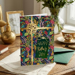 The Perfect Gift  Elegant Floral Mother's Day Real Foil Greeting Card<br><div class="desc">Celebrate Mom with a card that looks as beautiful as a wrapped gift! This vibrant Mother’s Day greeting card features a lush, colorful botanical pattern on a dark background, accented by a sophisticated gold ribbon and bow graphic. Designed to look like a present, it’s the perfect way to make your...</div>