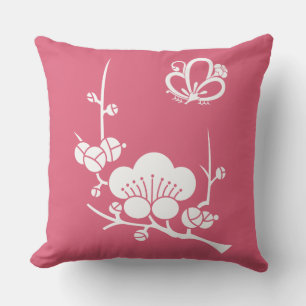 The plum-tree is in the middle of the shade cushion