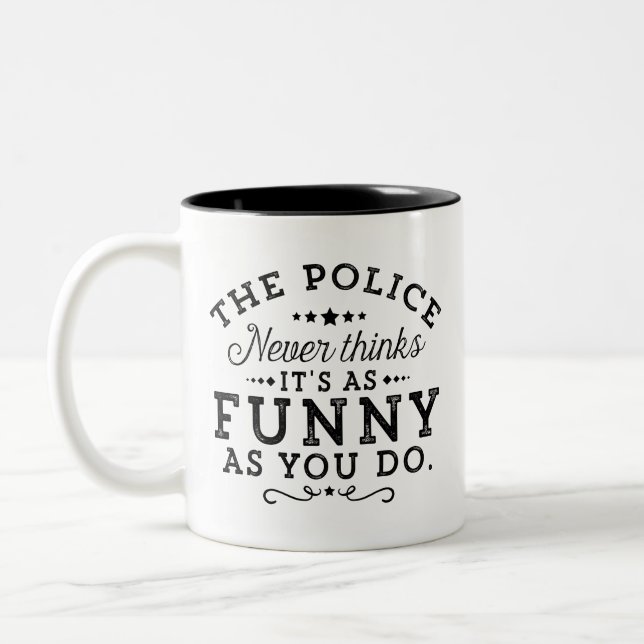 The police never thinks it's as funny as you do... Two-Tone coffee mug (Left)