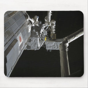The robotic arm of the Japanese Experiment Modu Mouse Pad