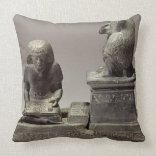 The royal scribe Nebmertuf writing under the prote Cushion