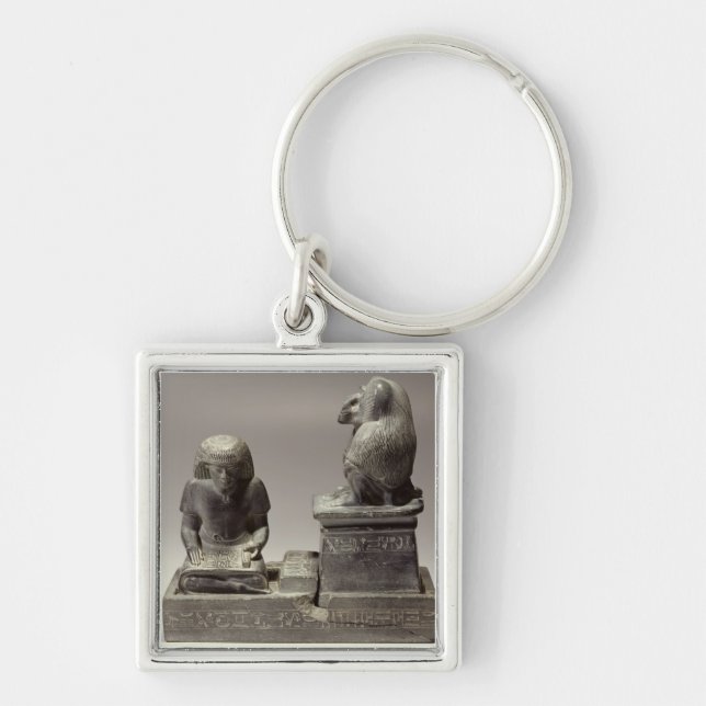 The royal scribe Nebmertuf writing under the prote Key Ring (Front)