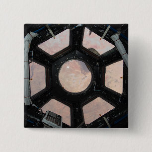 The Sahara Desert visible through the windows 15 Cm Square Badge