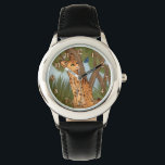 The Serval and the Butterfly Watch<br><div class="desc">A serval discovers a pretty blue butterfly while resting beneath the shade of the trees. This digital painting is available on many products in my store and can be personalised!</div>