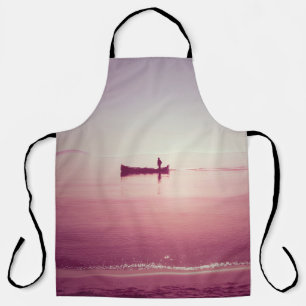The silhouette of fisherman with boat in the sea v apron