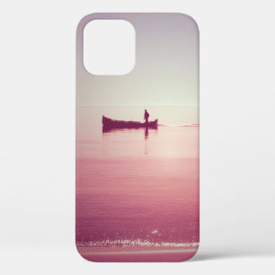 The silhouette of fisherman with boat in the sea v iPhone 12 case