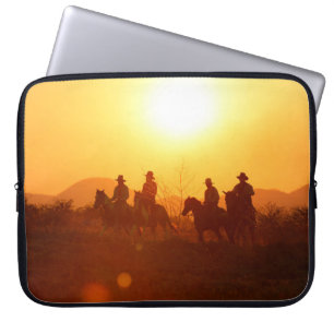 The silhouette of rider as cowboy outfit costume w laptop sleeve