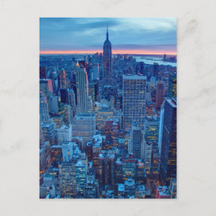 The skyscrapers of Manhattan are lit Postcard