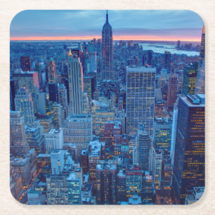 The skyscrapers of Manhattan are lit Square Paper Coaster