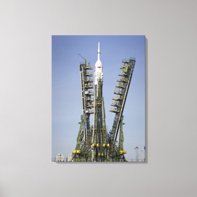 The Soyuz rocket is erected into position 4 Canvas Print (Front)