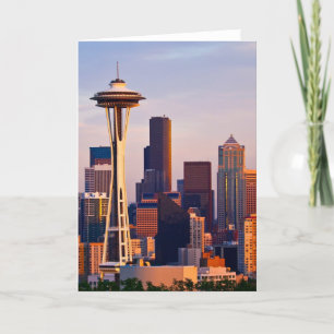 The Space Needle is a tower at dusk in Seattle Card