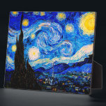 The Starry Night by Vincent Van Gogh Plaque<br><div class="desc">Vincent Van Gogh The Starry Night. This is an old masterpiece from the dutch master painter Vincent Van Gogh.This fine art landscape painting has beautiful,  vibrant,  saturated colour. Vincent Van Gogh was a dutch post impressionist painter. This image is in the public domain</div>